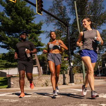 RWX group of runners crossing a crosswalk in boston