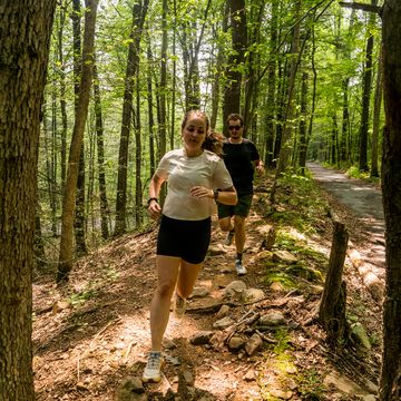 pavlina and john running on a trail in jacobsburg park 2023 pavlina and john running on a trail in jacobsburg park 2023