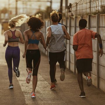 Friends jogging half marathon training plans