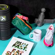foam roller, fanny pack, bucket hat, running shoes, head lamp, strava mug, run fast eat slow book
