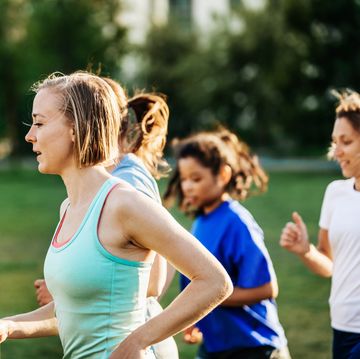 Group Of Women Out Running Together, training during menstrual cycle group of women out running together, training during menstrual cycle