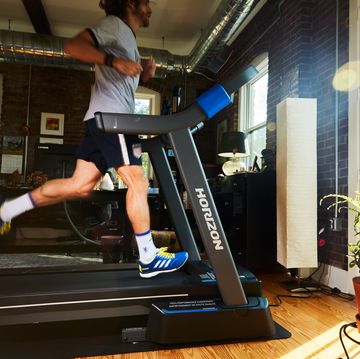 RWD running on a treadmill in front of a bright window