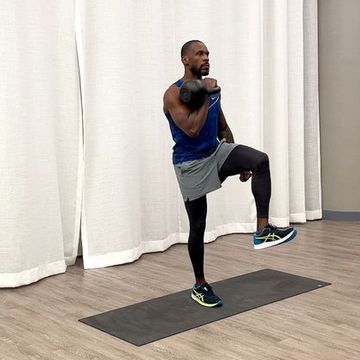 beginner kettlebell workout, jeffers practicing the front racked march exercise