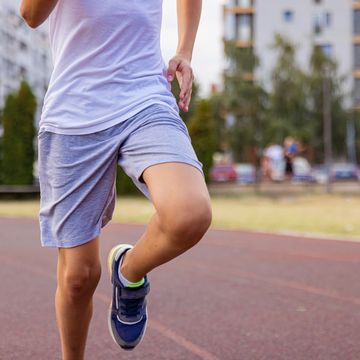 kid running on the track