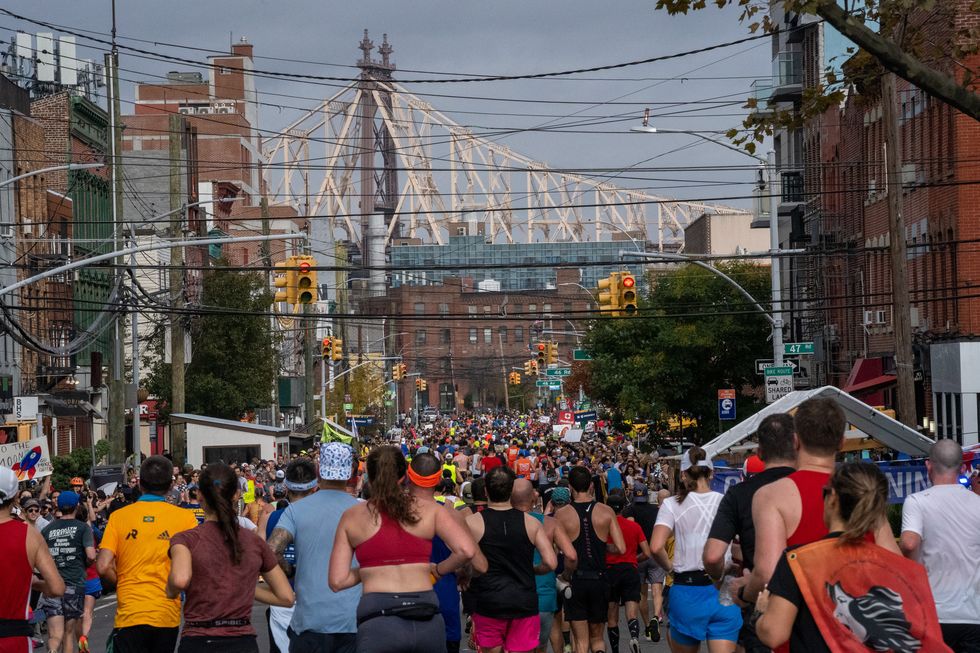 a large crowd of runners during the 2022 new york city marathon