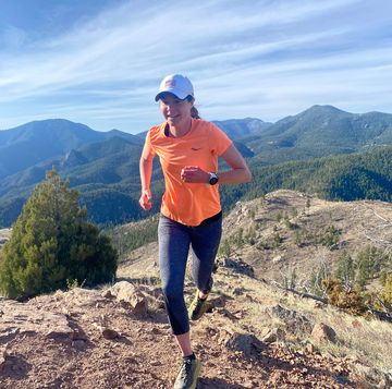 runner and scientist megan roche running on a trail runner and scientist megan roche running on a trail