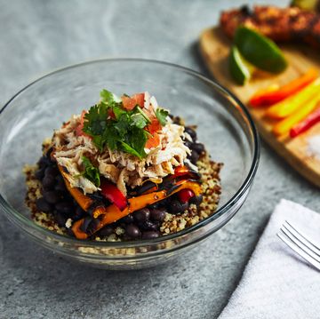 RWD a rice bowl with the ingredients laid out sit on a table