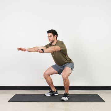 Trainer Ian Finestein performing a series of squat exercises in May 2022 trainer ian finestein performing a series of squat exercises in may 2022