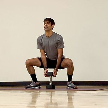 Glute dumbbell workout, Hathiramani performs the sumo squat exercise glute dumbbell workout, hathiramani performs the sumo squat exercise