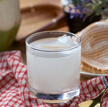 The coconut water serving in a drinking glass benefits of coconut water the coconut water serving in a drinking glass