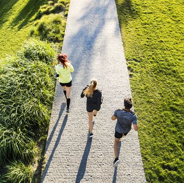 Young athtletes in the city running in park. Young athtletes in the city running in park.